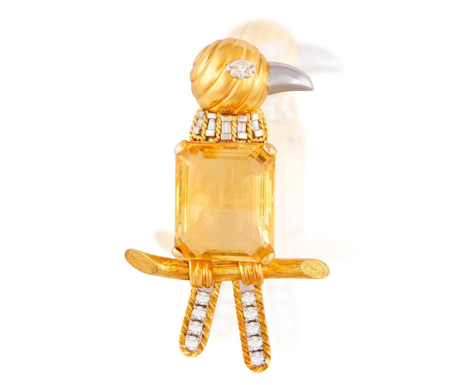 A CITRINE AND DIAMOND NOVELTY BROOCH Designed as a bird perched on a branch, the chest set with a: A CITRINE AND DIAMOND NOVELTY BROOCH Designed as a bird perched on a branch, the chest set with a rectangular-cut citrine weighing approximately 36.00cts, polished gold head with reeded detailing and 