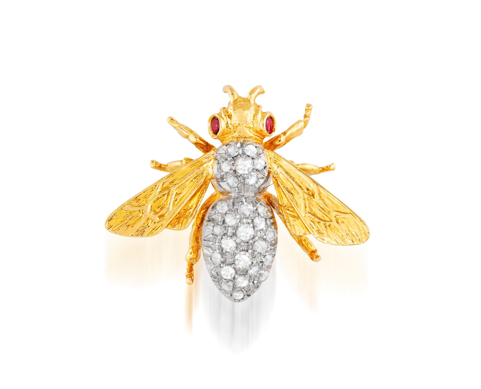 A DIAMOND AND RUBY BROOCH Modelled as a stylised insect, the body pavé-set with single-cut (1 of 4)