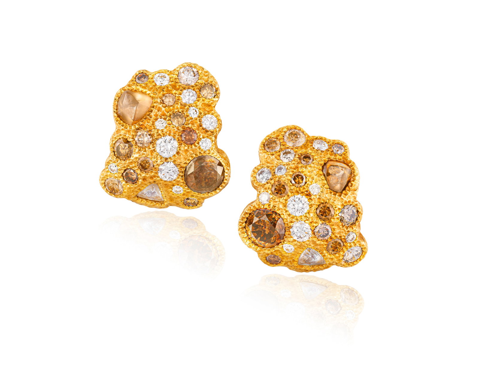 DE BEERS: A PAIR OF DIAMOND AND COLOURED DIAMOND EARCLIPS Of abstract textured design, each set: DE BEERS: A PAIR OF DIAMOND AND COLOURED DIAMOND EARCLIPS Of abstract textured design, each set with brilliant-cut and polished-rough diamonds of various tints, mounted in 18K gold, diamonds approxima