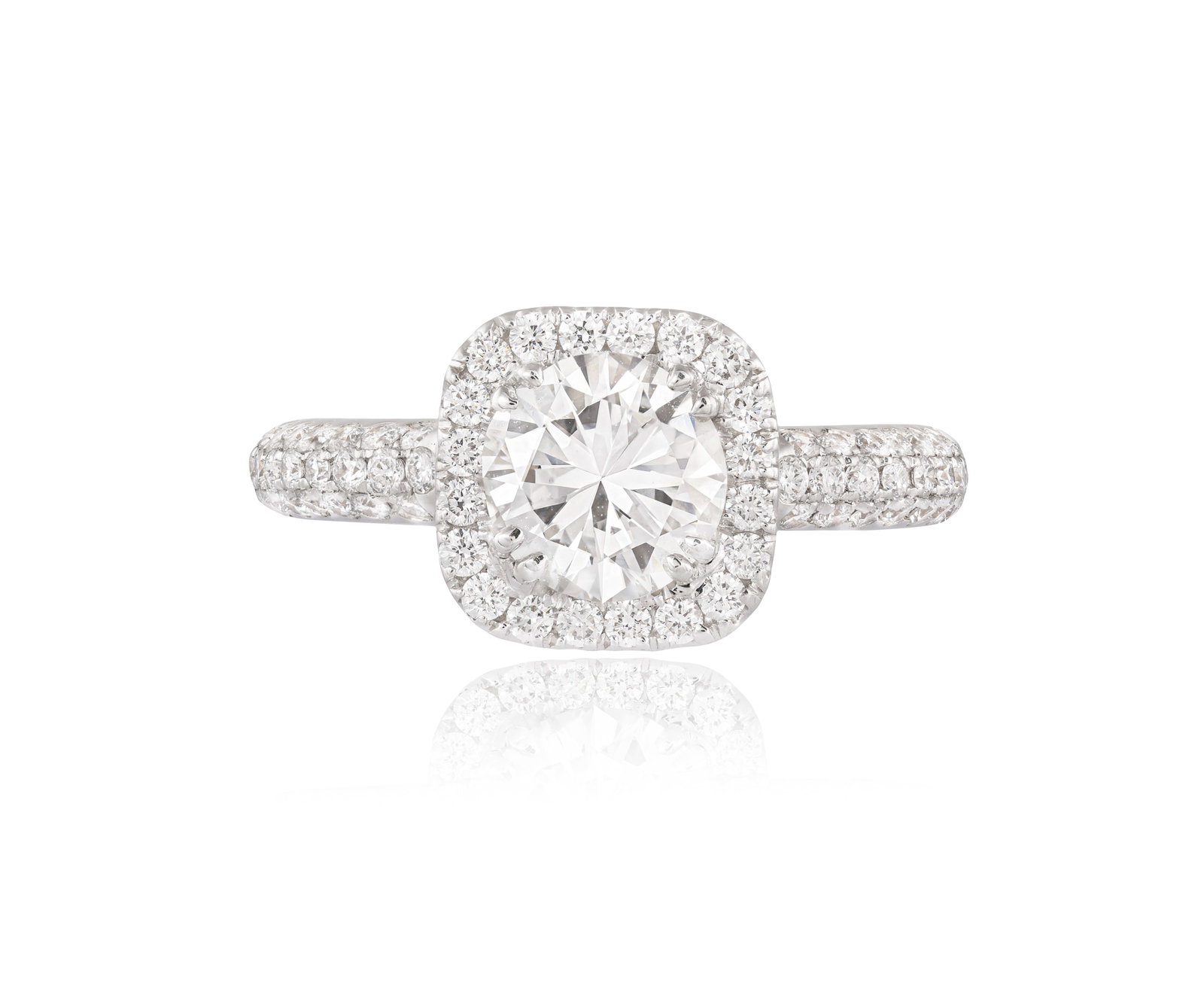 A DIAMOND SINGLE-STONE RING Set with a brilliant-cut diamond at the centre within a double (1 of 4)