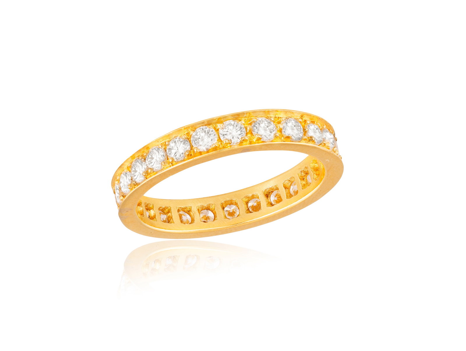 A DIAMOND ETERNITY RING Composed of a continuous row of brilliant-cut diamonds, mounted in 18K: A DIAMOND ETERNITY RING Composed of a continuous row of brilliant-cut diamonds, mounted in 18K gold, diamonds approximately 0.80ct total, ring size O