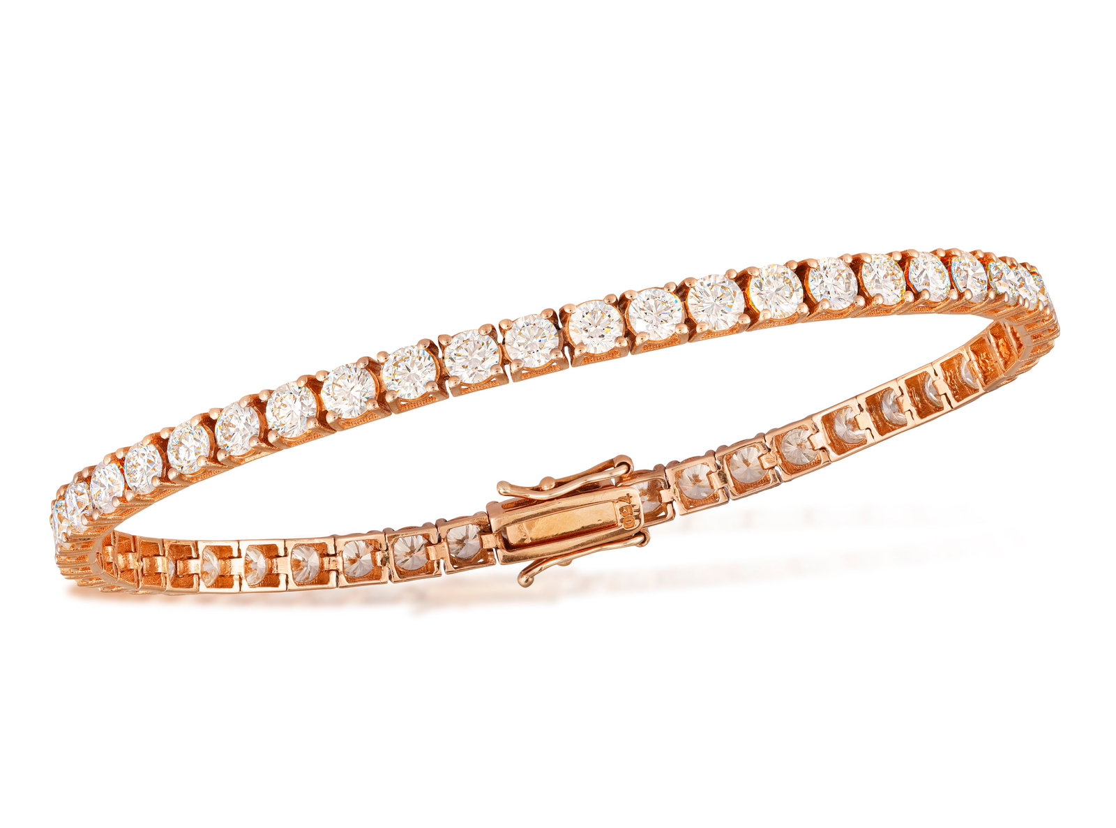 A DIAMOND LINE BRACELET The continuous row of brilliant-cut diamonds within claw-setting, mounted (1 of 4)