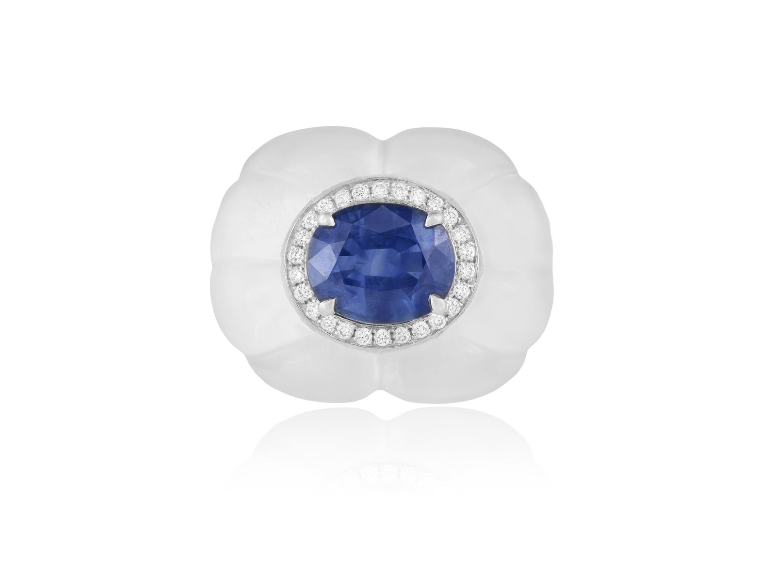 A ROCK CRYSTAL AND SAPPHIRE DRESS RING Designed as a carved rock crystal dome of fluted scalloped (1 of 5)