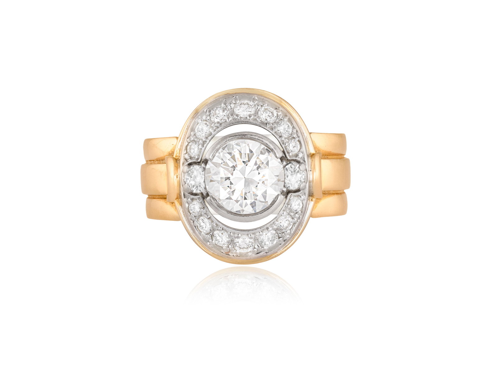 OTTO POULSEN: A DIAMOND DRESS RING Of openwork oval design, the central transitional-cut diamond (1 of 4)