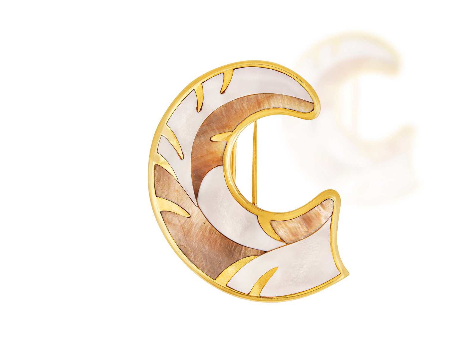 TIFFANY & CO. DESIGNED BY ANGELA CUMMINGS: A MOTHER-OF-PEARL BROOCH, CIRCA 1980 Of crescent shape,: TIFFANY & CO. DESIGNED BY ANGELA CUMMINGS: A MOTHER-OF-PEARL BROOCH, CIRCA 1980 Of crescent shape, inlaid with white and grey mother-of-pearl with polished gold highlights, within polished gold frame,