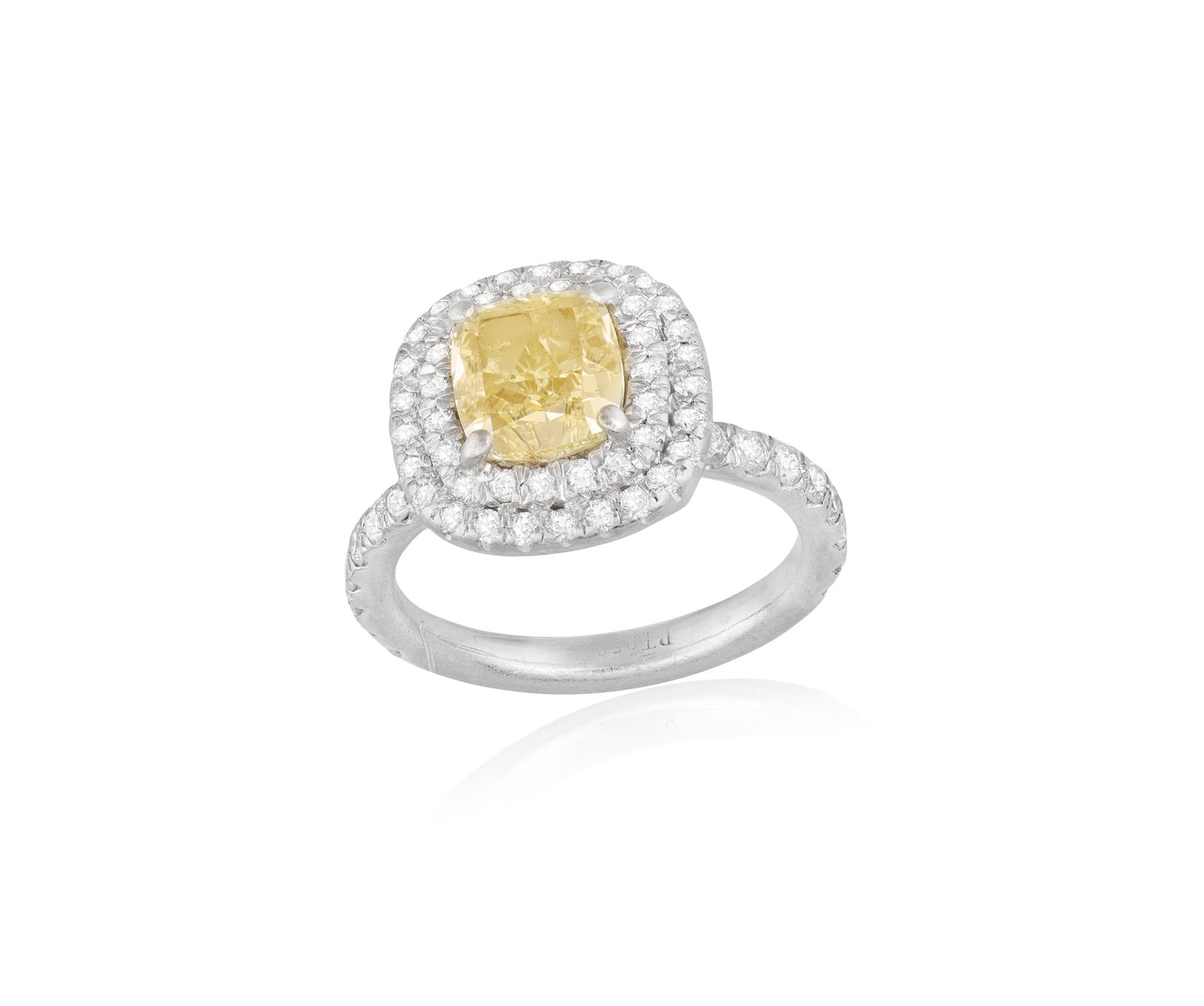A COLOURED DIAMOND SINGLE-STONE RING The cushion-shaped diamond, within a four-claw setting, to a (1 of 4)