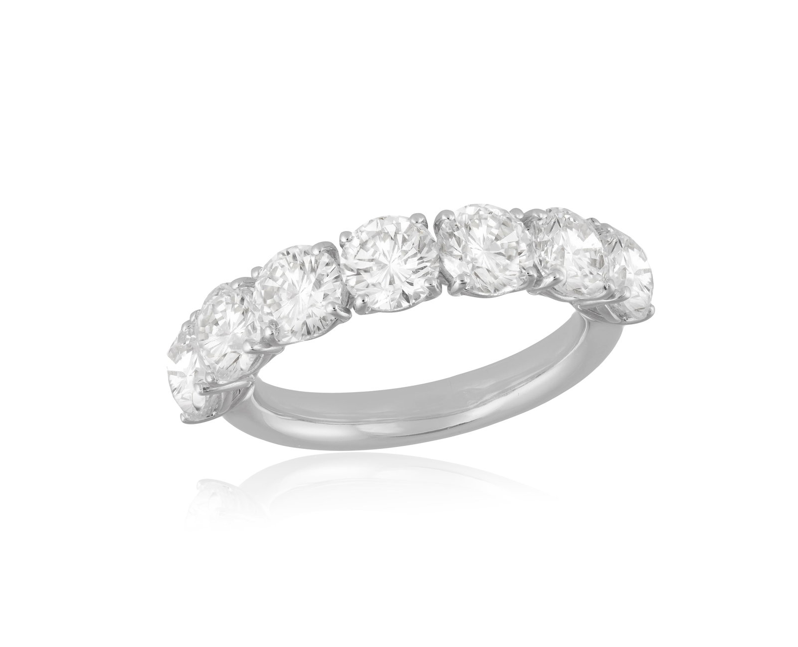 A DIAMOND SEVEN-STONE RING Set with seven brilliant-cut diamonds weighing approximately 3.50cts (1 of 3)