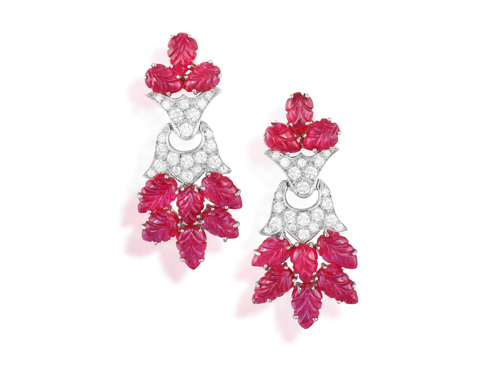 A PAIR OF RUBY AND DIAMOND EARRINGS Of foliate design, each two-tier articulated cluster set with: A PAIR OF RUBY AND DIAMOND EARRINGS Of foliate design, each two-tier articulated cluster set with carved ruby leaves highlighted with brilliant-cut diamonds, mounted in 18K gold, rubies approximately 