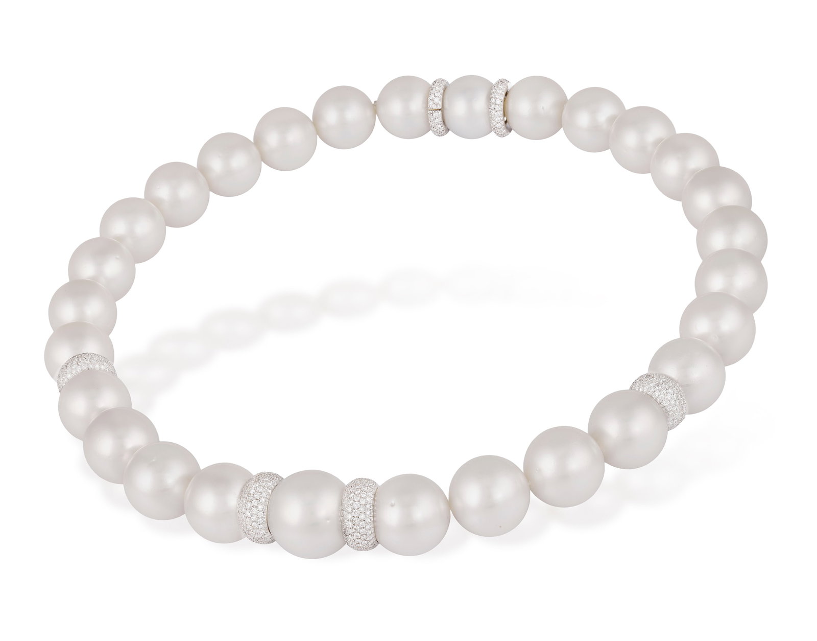 AN IMPRESSIVE CULTURED PEARL AND DIAMOND NECKLACE Composed of a single row of graduated South Sea (1 of 3)