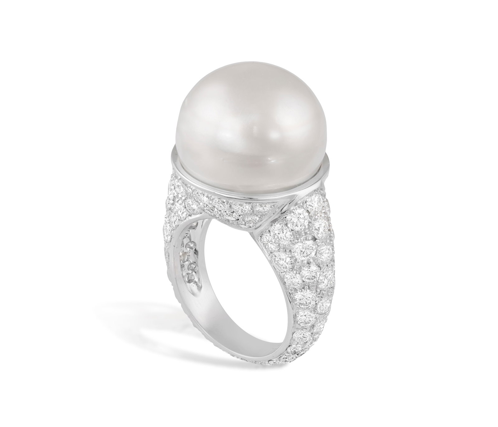 A CULTURED PEARL AND DIAMOND DRESS RING The South Sea cultured pearl of white tint, measuring: A CULTURED PEARL AND DIAMOND DRESS RING The South Sea cultured pearl of white tint, measuring approximately 17.36mm, raised on a mount pavé-set with brilliant-cut diamonds throughout, mounted in 