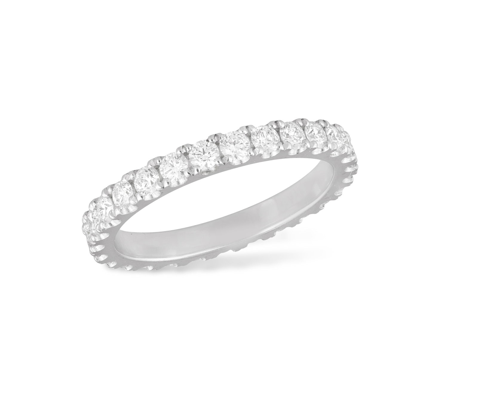 A DIAMOND ETERNITY RING The continuous row of brilliant-cut diamonds within claw-setting, mounted (1 of 3)