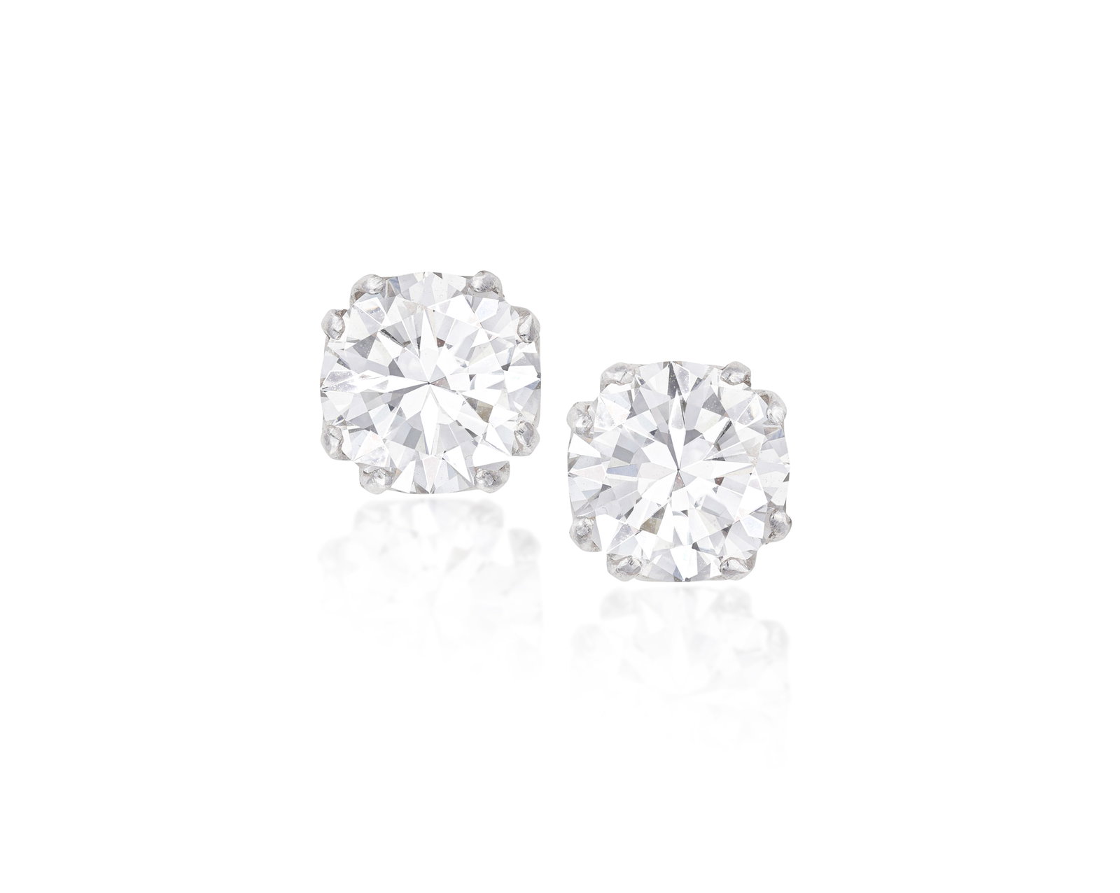 A PAIR OF DIAMOND EARSTUDS The two transitional-cut diamond weighing respectively approximately (1 of 2)
