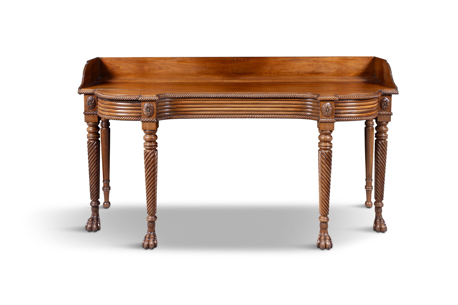 AN IRISH GEORGE III MAHOGANY SIDEBOARD, PROBABLY CORK, EARLY 19TH CENTURY, with three-quarter: AN IRISH GEORGE III MAHOGANY SIDEBOARD, PROBABLY CORK, EARLY 19TH CENTURY, with three-quarter galley above a shaped top with gadrooned edge and a reeded frieze on tapering rope twist legs and paw feet