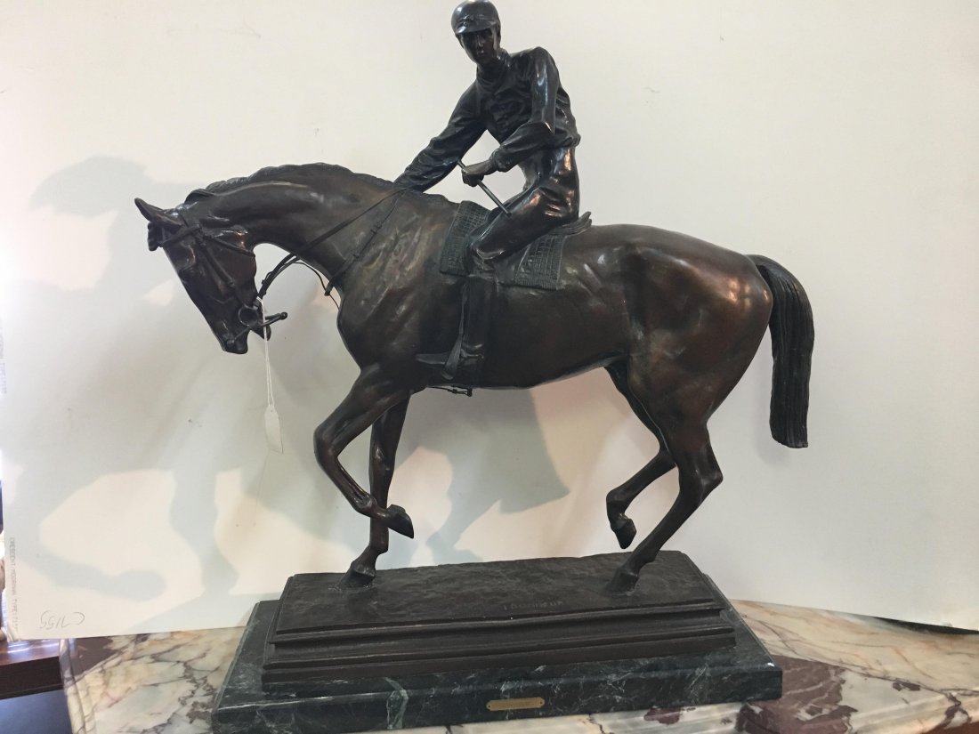 After Isidore Bonheur ,French 1827-1901 Le Grand Jockey: After Isidore-Jules Bonheur (French, 1827-1901) Le Grand Jockey. Inscribed I Bonheur . A large Bronze statue of a jockey astride a horse, dark brown patina,signed in cast I. Bonheur, resting on marble