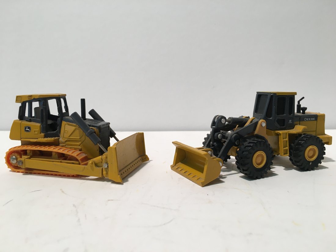 2 ERTL John Deere metal toys: Two ERTL John Deere Metal toys. one Crawler loader and a wheel loader.