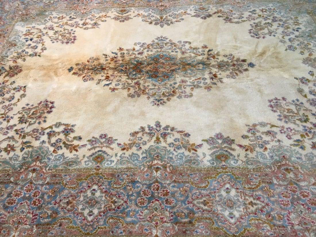 A handwoven Persian kerman wool Rug - damaged (1 of 8)