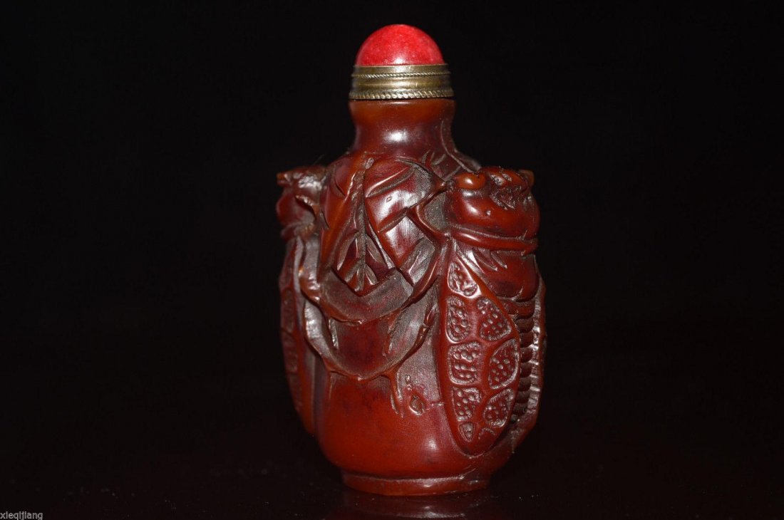 An old Chinese crickets snuff bottle: An old Chinese Hand carved crickets snuff bottle