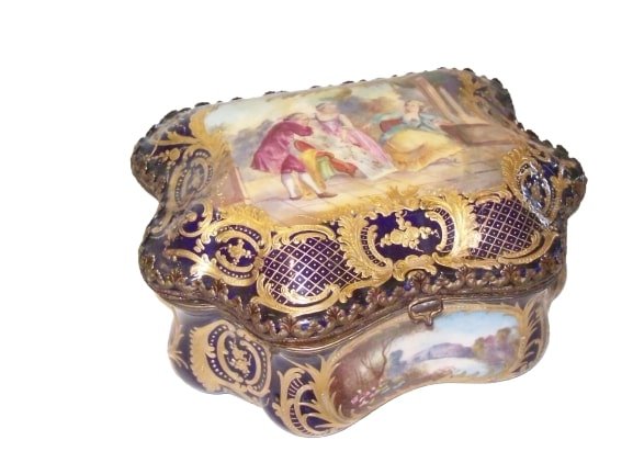 Antique French hand painted porcelain Sevres box: Antique French Sevres / Sevre porcelain jewelry box measuring (9" x 7" x 4" ).A lovely decorative large jewelry box ,casket and it is highlighted with 24k gold decorations and beautiful hand painted f