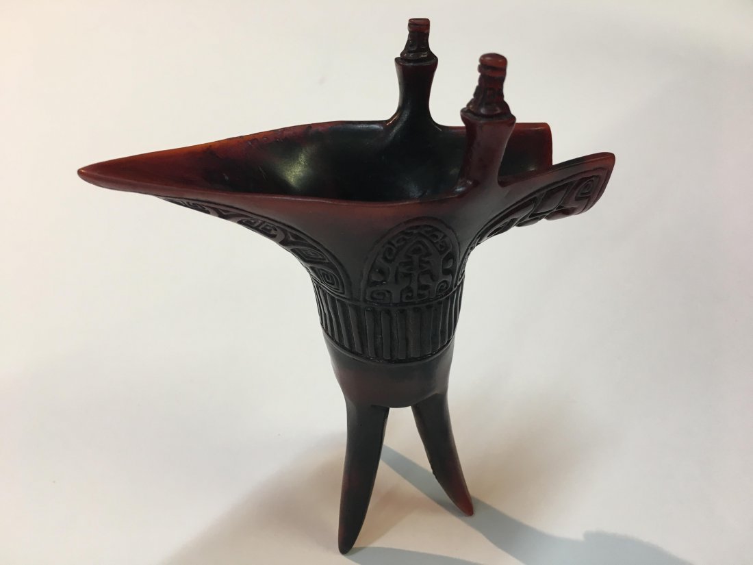 A Chinese Wine vessel ritual cup: A Chinese Wine vessel ritual cup with three legs.