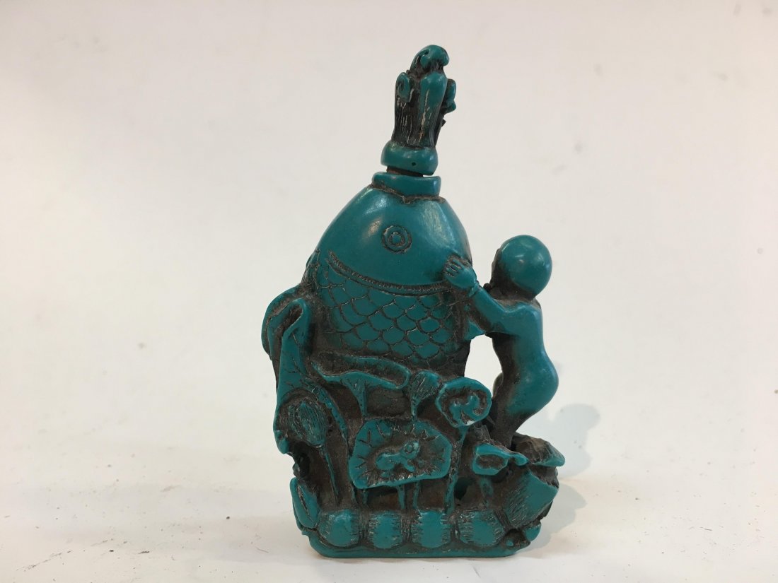 An old Chinese snuff bottle: An old Chinese hand carved snuff bottle.