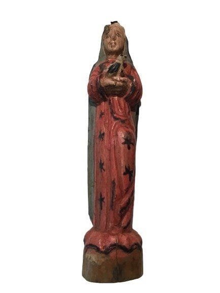 A carved wood figure Baroque style statue: A carved wood figure Baroque style statue.measures 15" inches tall by 6" inches wide.
