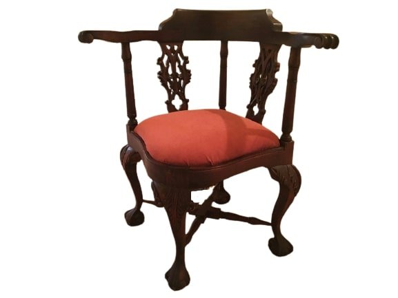 A corner chair with Ball & claw feet: A corner chair with Ball & claw feet 33 inches by 30 inches.