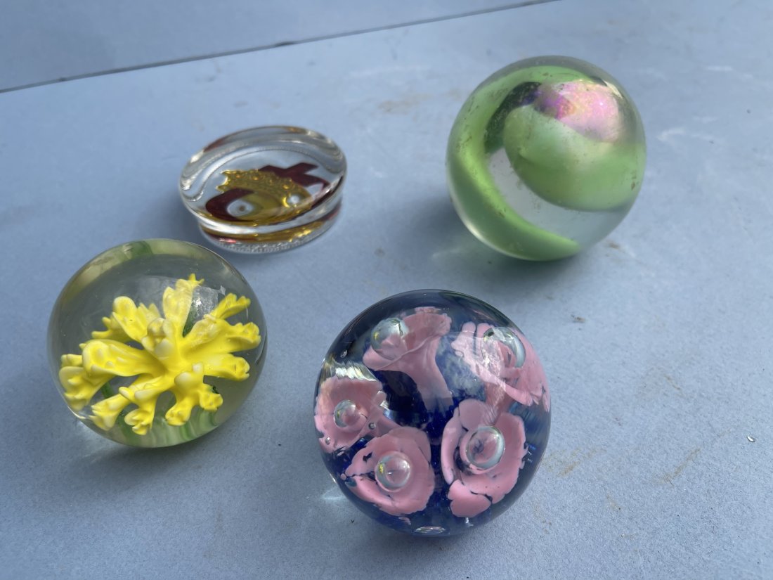 Group of four glass paper weights (1 of 8)