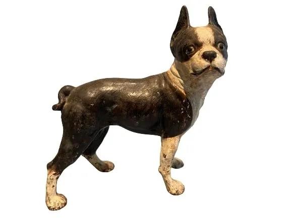 A Cast Iron Boston Terrier Doorstop: A Cast Iron Boston Terrier doorstop. stands 10 inches tall and about 10 inches long.