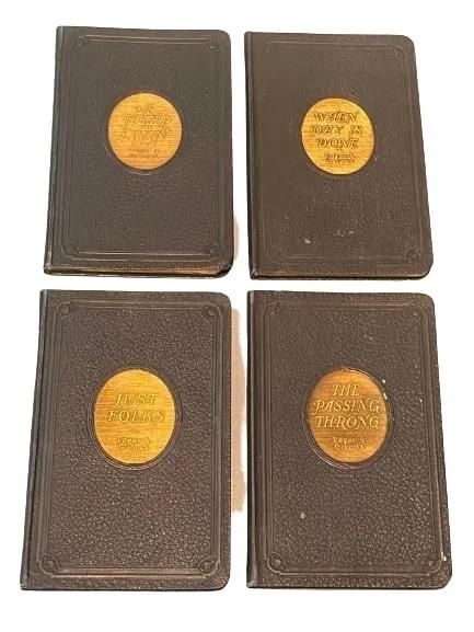 Edgar A Guest four volume poem books: Edgar A Guest four volume poem books published by The Reilly & Lee co. All edge gilt on all four volumes with the following title:WHEN DAY IS DONE , JUST FOLKS, THE PASSING THRONG, A HEAP O' LIVIN.