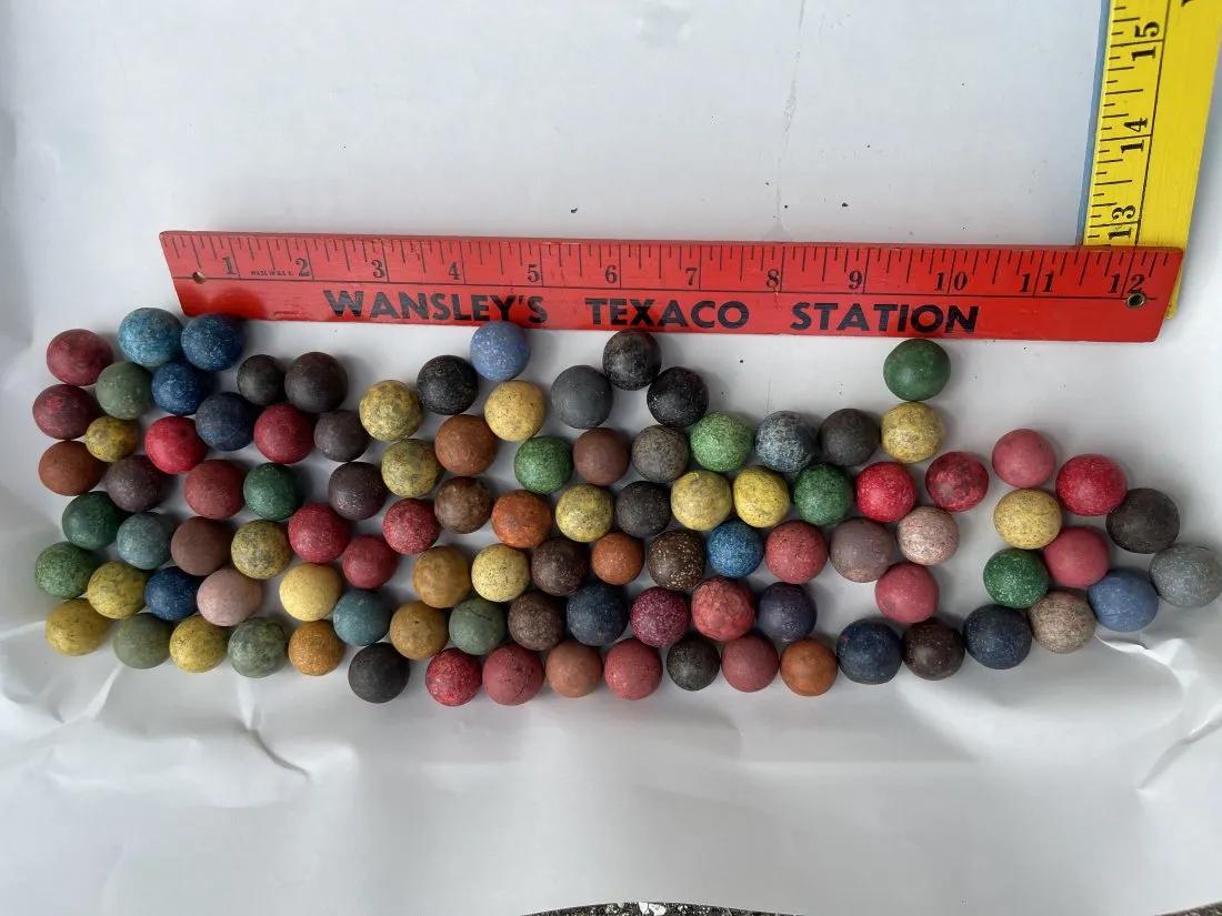 Antique collection of Porcelain Marbles: Antique collection of Porcelain Marbles in a jar. 19th century marbles of different colors & textures.