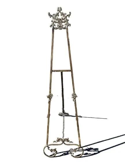 Artist metal Easel art stand: Artist metal Easel art stand measuring 19 inch wide bade by 67 inches tall.