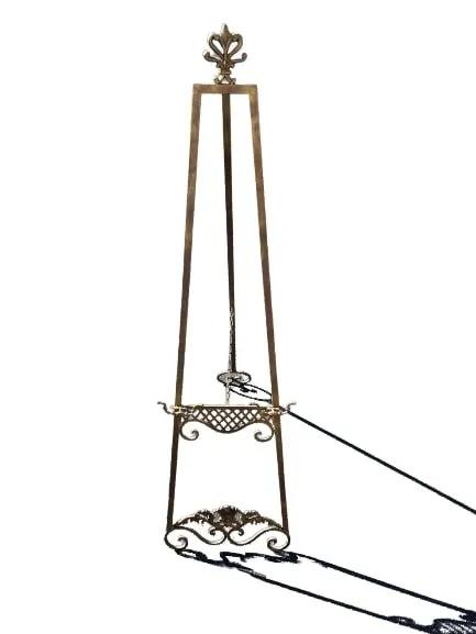 Artist metal Easel art stand: Artist metal Easel art stand measuring 19 inch wide bade by 67 inches tall.