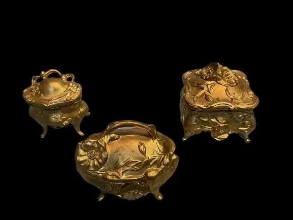 Three Victorian French Bombay Cast Metal Jewelry Boxes: Three Victorian French Bombay Cast Metal Jewelry Boxes possibly by the Jennings brothers.French Victorian, Bombay sides, Rococo design with roses, Footed Jewelry Box, Gold paint patina finish.