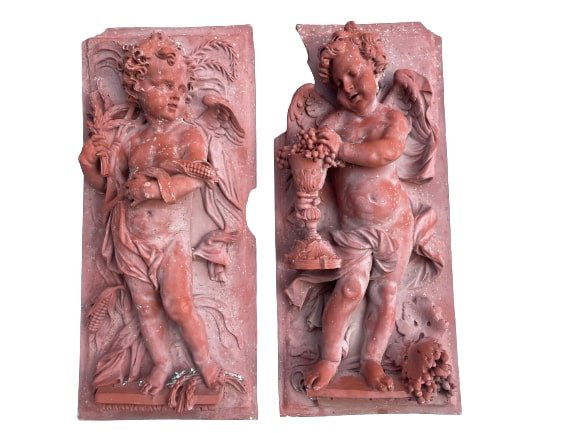 Pair of large Terracotta garden wall hanging Cherub reliefs: Pair of large Terracotta garden wall hanging Cherub reliefs. A Unique set of Architectural & Garden Elements, Each Cherub relief measures 14 inches wide by 31 inches long. Each relief measures 26.8 po