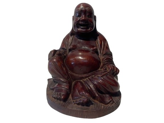 Asian Laughing Buddha hand carved rose wood statue: Asian Hand Carved Laughing Buddha rose wood statue measuring 7 inches tall.Laughing Buddha is also known as Budai and being the representation of joy and happiness, laughing Buddha statues is believed