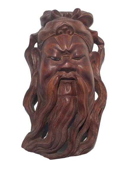 Antique Chinese Carved Wood Shou Mask: Antique Chinese Carved Wood Shou Mask. A hand carved wood old man statue. A fine wall hanging wooden mask of a male figure with beard measuring 8 1/2 inches long by 5 inches wide.