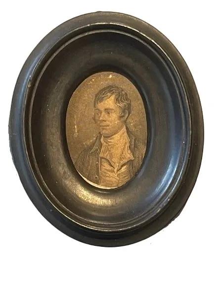 Antique Miniature Etching of Scottish poet Robert Burns: Antique Miniature Etching Of Scottish poet Robert Burns placed in an oval frame. Sight measuring 2 inches long wide by 1 1/2 inches wide. Frame measures 3 1/2 wide by 4 inches long.Robert Burns (25 Ja