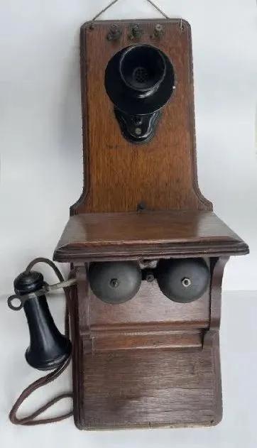 Antique Kellogg wall mount fiddleback oak panel phone: Antique Kellogg wall mount fiddleback oak panel phone. Also Known as Kellogg Common battery phone.