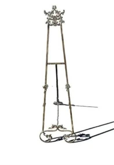Victorian style artist Brass Easel: Victorian style Artist metal Easel art stand measuring 19 inch wide bade by 67 inches tall.