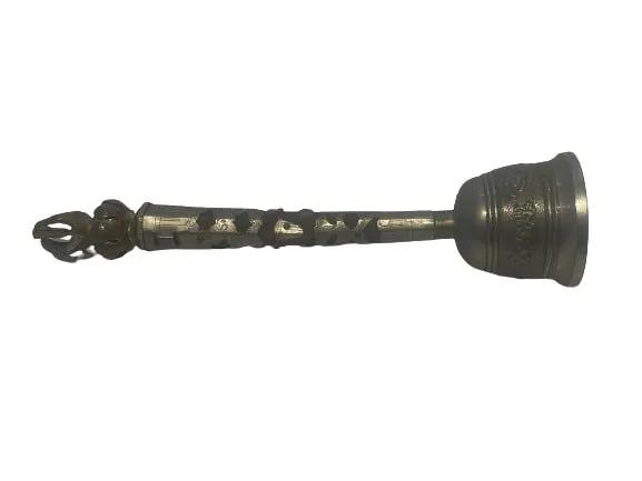 A Tibetan shrine hand bell: A Tibetan shrine hand bell measures 8 1/2 inches tall. A wooden handle with hand chased metal decoration bell with a nice ring bell.
