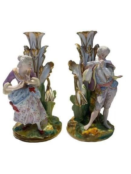 Pair of European porcelain Candlesticks: Pair of European porcelain Candlesticks. Each standing 10 3/4 inches tall.Beautiful set of French porcelain candle holders. Please read the condition report below.
