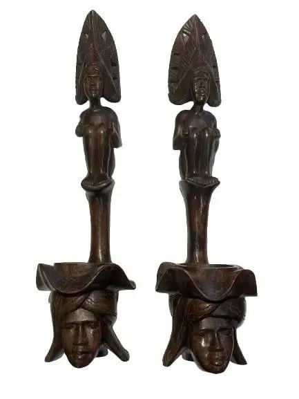Pair of African Wood hand carved decorative statues: Pair of African Wood hand carved statues. Each measuring 24 inches tall and 7 inches wide. Unique decorative objects.