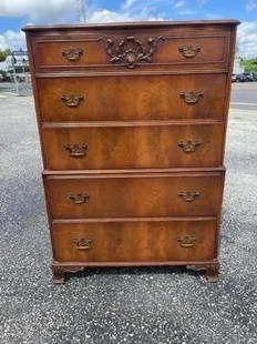 Antique Chest on Chest of drawers by Landstrom: Antique Pierced Chippendale Chest on Chest of drawers by Landstrom Furniture Corporation of Rockford Illinois. Applied flame Mahogany design.Measurements : 20 x 35 x 50 inches tall Top drawer has the