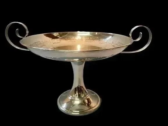 A Nickel Silver fruit bowl by E & JB Empire art silver: A Nickel silver plated fruit bowl by E & JB Empire art silver company.