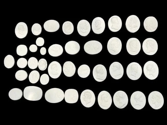 Collection of GRAND TOUR PLASTER INTAGLIO'S: Collection of GRAND TOUR PLASTER INTAGLIO'S. A group of plaster intaglios with different subjects. selling all loose intaglios in one bag.