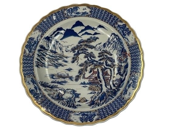 A Japanese Asian porcelain charger plate: A Japanese Asian porcelain charger plate measuring 14 inches in diameter.