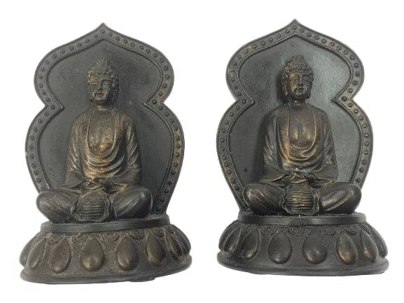 A pair of Buddha bookends: A pair of seated Buddha bookends measuring 6 inches tall.
