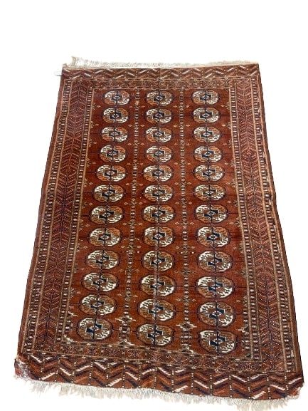 Antique Turkoman Bokara scatter rug: Antique Turkoman Bokara scatter rug measuring 3 feet 8 inches wide by 5 feet 3 inches long. A wool on wool handwoven tribal Turkoman rug with a unique elephant foot design known as bokara.