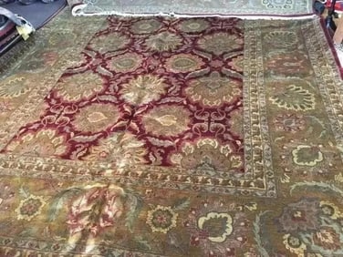 A large handwoven Indian Agra wool Rug