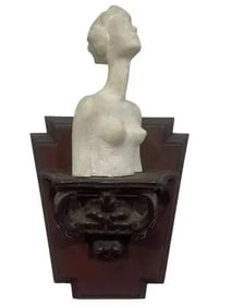 A unique Female Clay Bust on a sconce